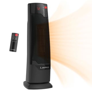 A black portable tower heater with black remote