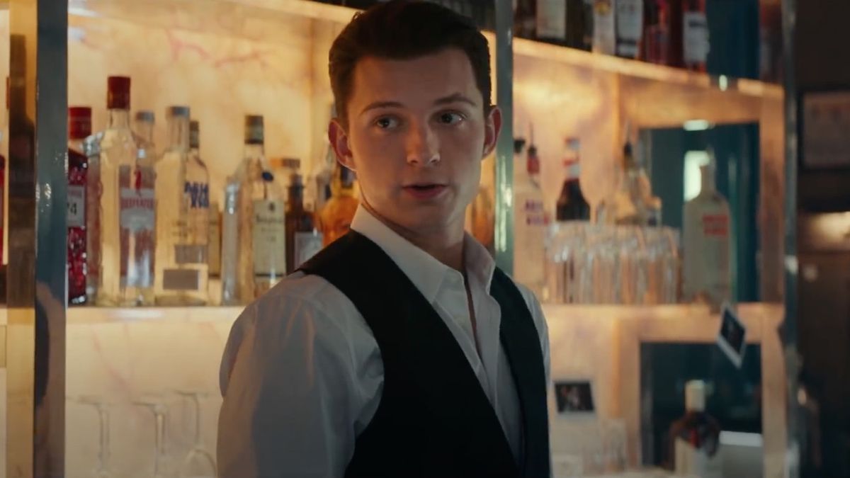 Tom Holland wearing tuxedo vest in Uncharted movie