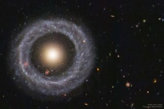 With a perfectly symmetrical ring circling a red sphere of stars, Hoag's object is one of the prettiest mysteries in the universe.
