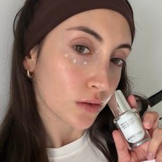 Who What Wear associate beauty editor Alyssa Brascia holding eye creams.