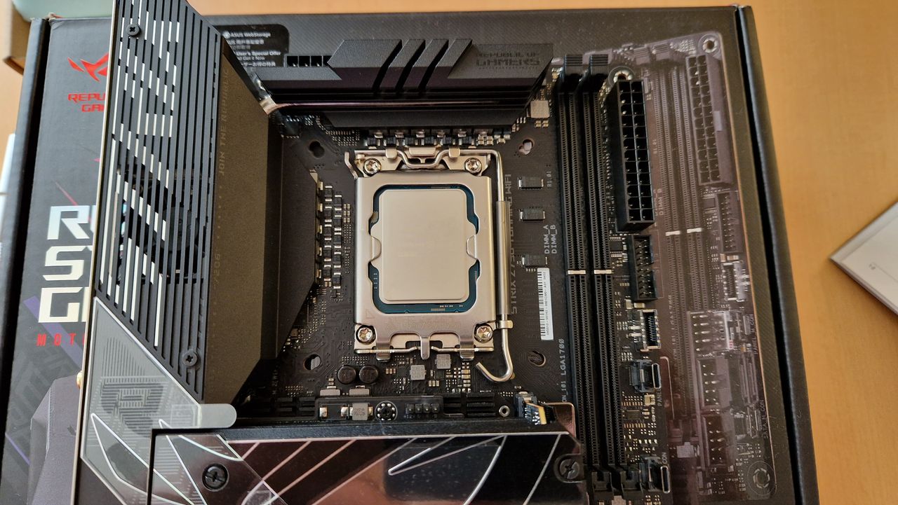 Intel Core i5-13600K seated on a motherboard from above