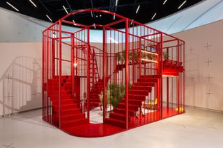 X Is Not A Small Country exhibition, red architectural installation