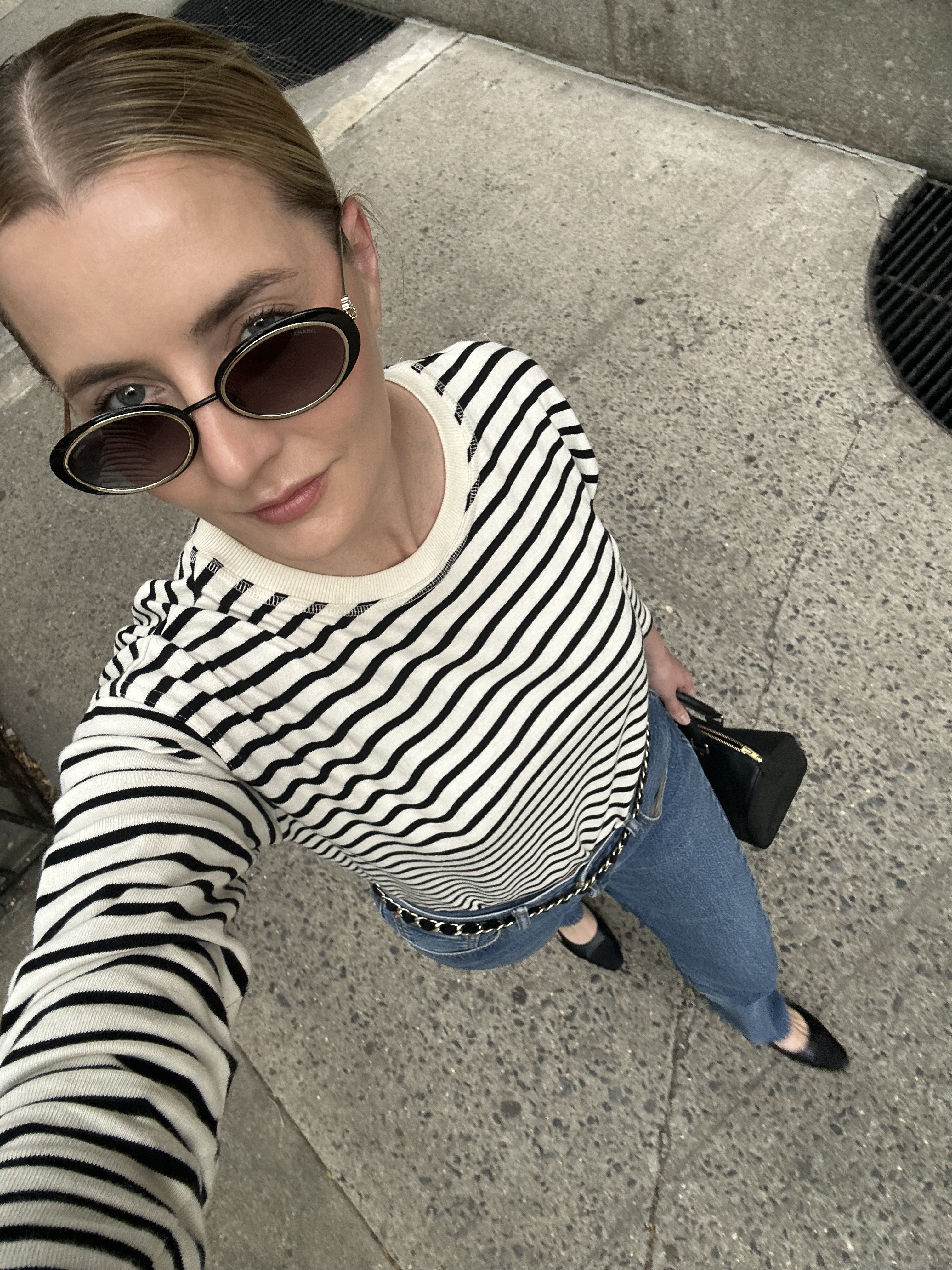 Editor wearing outfit with Chanel sunglasses.