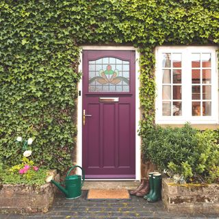 1930s style purple front door with glazed window