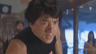 Jackie Chan wears a black shirt in Rumble in the Bronx