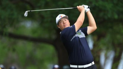 Sungjae Im plays his shot on the fourth hole during the second round in The Masters.