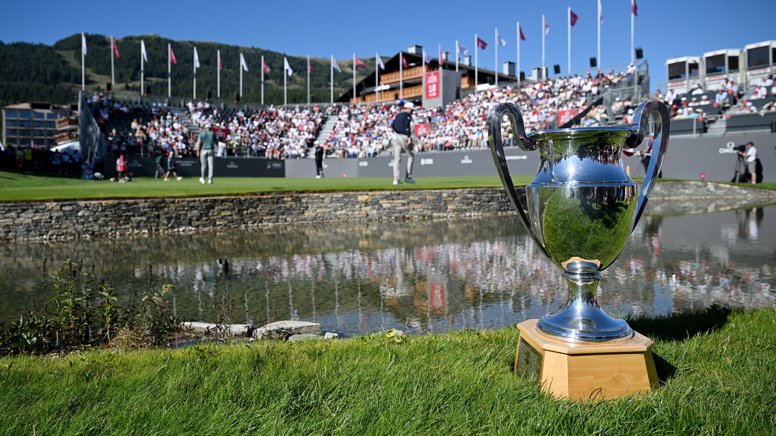 The Omega European Masters trophy in front of the 18th green
