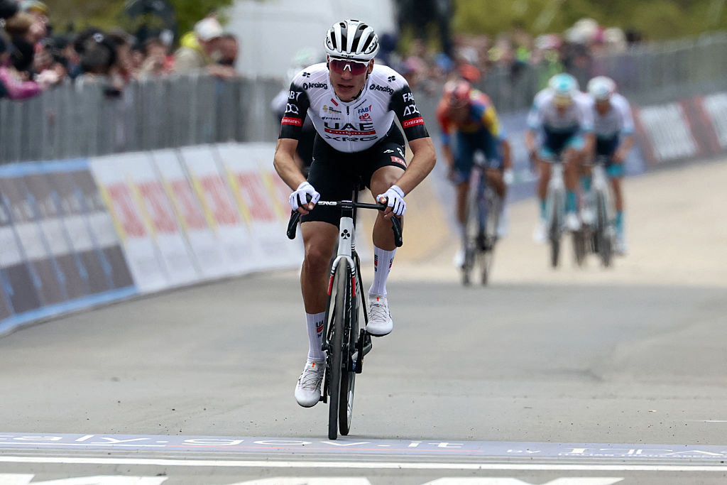 UAE Team Emirates XRG's Spanish rider Juan Ayuso celebrates after victory as he crosses the finish of the 7th stage of the 108th Giro d'Italia cycling race 168kms from Castel di Sangro to Tagliacozzo on May 16, 2025. (Photo by Luca Bettini / AFP)