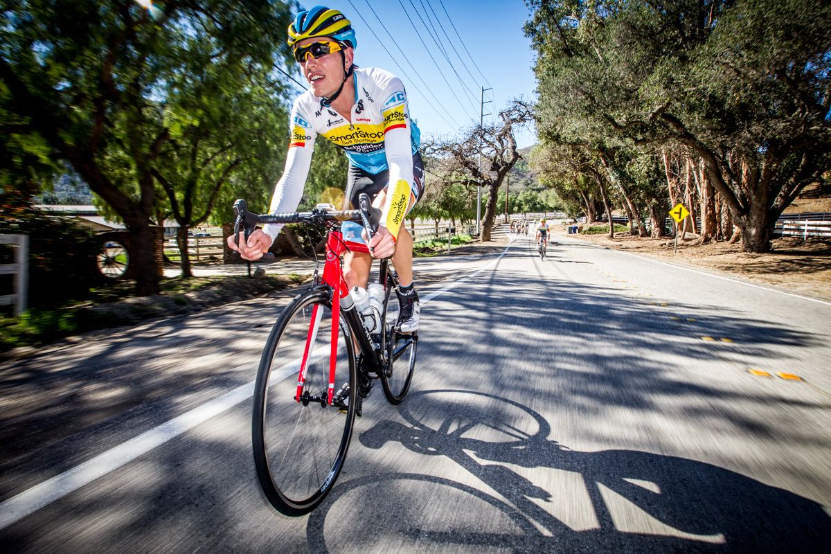 Kristofer Dahl takes a flyer off the front of the team ride.