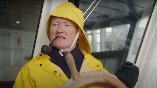 Conan O'Brien in fisherman outfit in 2024 travel show