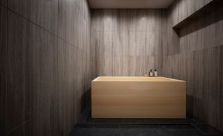 Wood walls with a Hinoki wood bath.