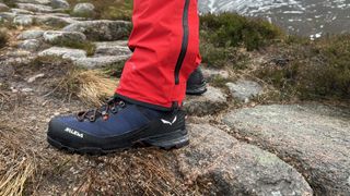 Salewa Ortles Edge boots on a trail