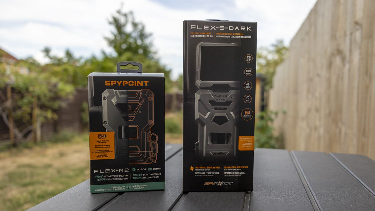 The Spypoint FLEX-S-Dark and M2 trail camera boxes next to each other