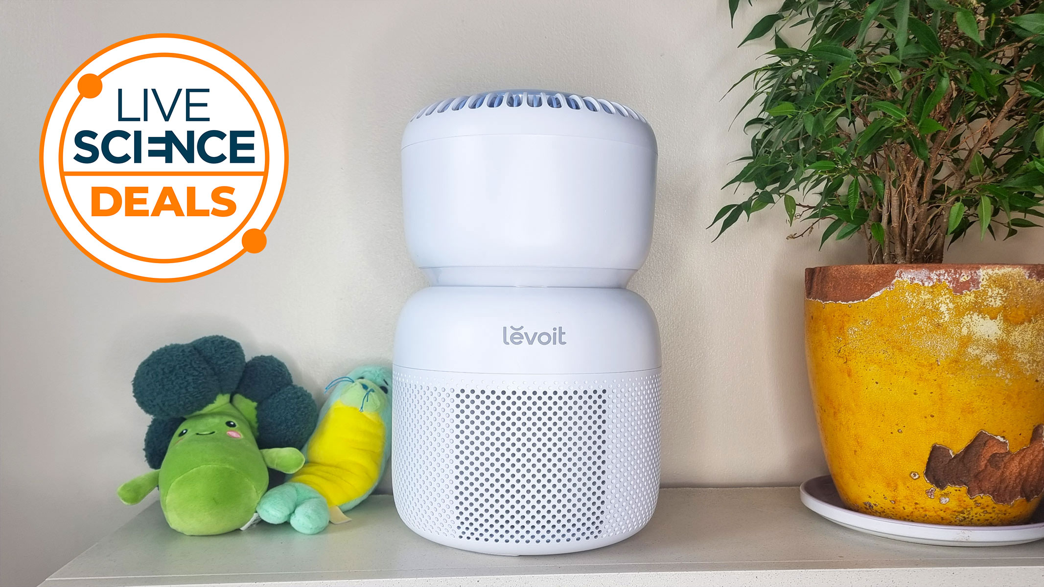 A Live Science Deals logo and a picture of our reviewer's Levoit Sprout air purifier