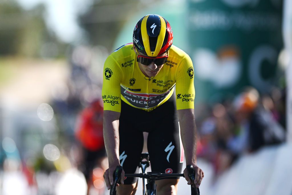 ALTO DO MALHAO PORTUGAL FEBRUARY 18 Final overall winner Remco Evenepoel of Belgium and Team Soudal Quick Step Yellow leader jersey crosses the finish line during the 50th Volta ao Algarve em Bicicleta 2024 Stage 5 a 1658km stage from Faro to Alto do Malhao 514m on February 18 2024 in Alto do Malhao Portugal Photo by Dario BelingheriGetty Images