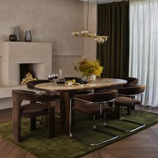 John Lewis Curve dining armchair in a modern dining room with a marble-top table