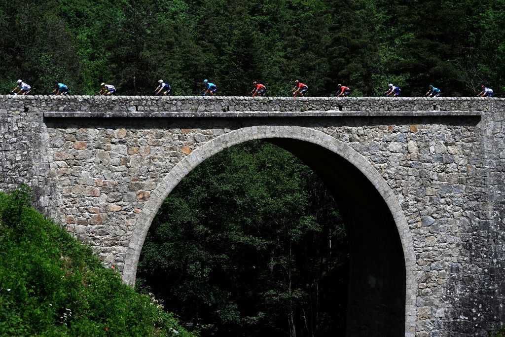 BRIVESCHARENSAC FRANCE JUNE 06 A general view of Ethan Hayter of United Kingdom and Team INEOS Grenadiers White Best Young Rider Jersey and the peloton competing during the 74th Criterium du Dauphine 2022 Stage 2 a 1698km stage from SaintPray to BrivesCharensac WorldTour Dauphin on June 06 2022 in BrivesCharensac France Photo by Dario BelingheriGetty Images