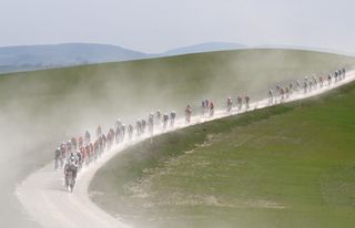 SIENA ITALY MARCH 08 A general view of the peloton passing through a landscape during the 19th Strade Bianche 2025 Mens Elite a 213km one day race from Siena to Siena 320m UCIWT on March 08 2025 in Siena Italy Photo by Tim de WaeleGetty Images