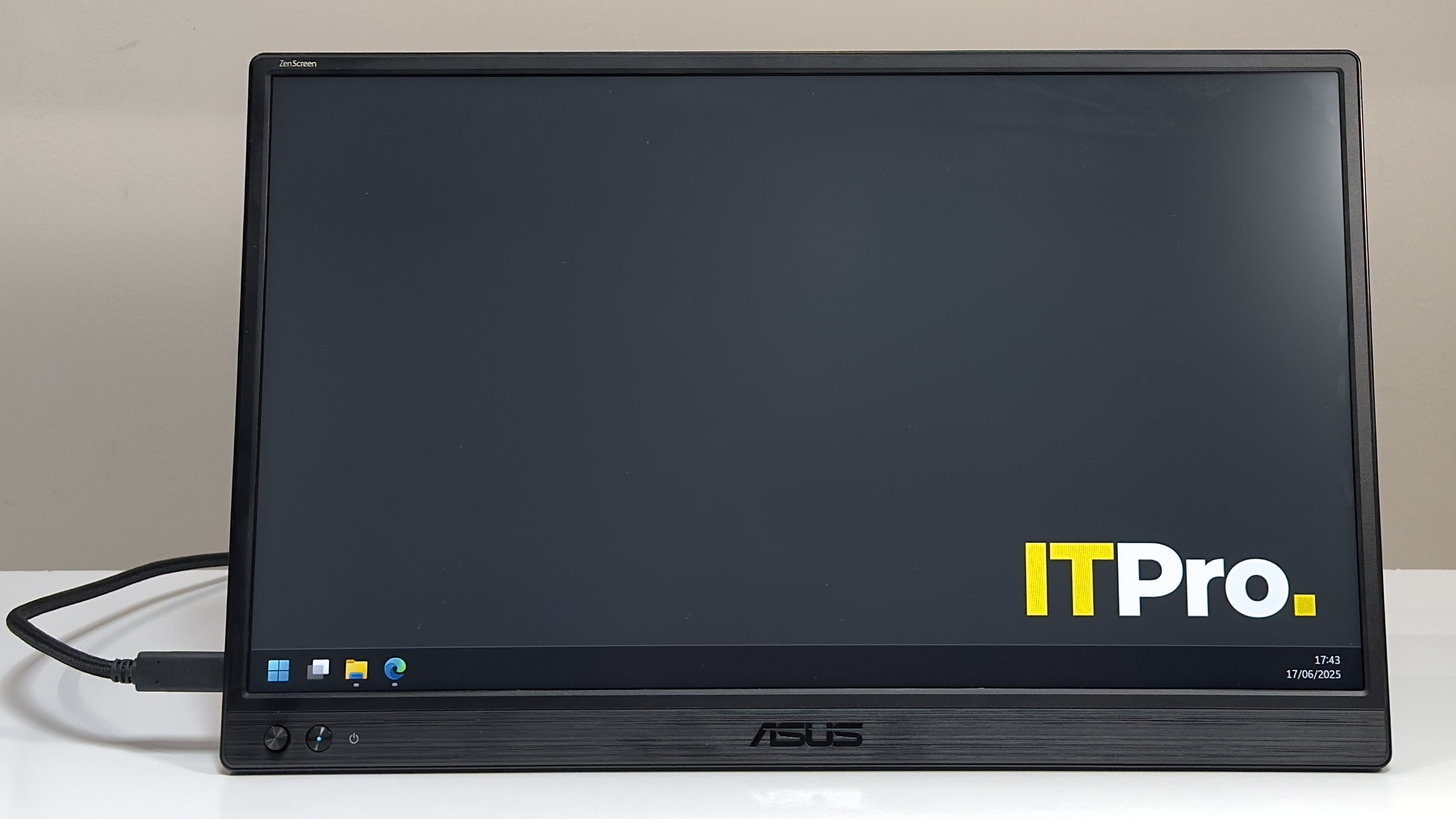 The Asus ZenScreen MB169CK on a desk