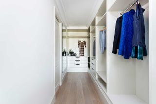 color organized closet ideas white walk in wardrobe by Hux London