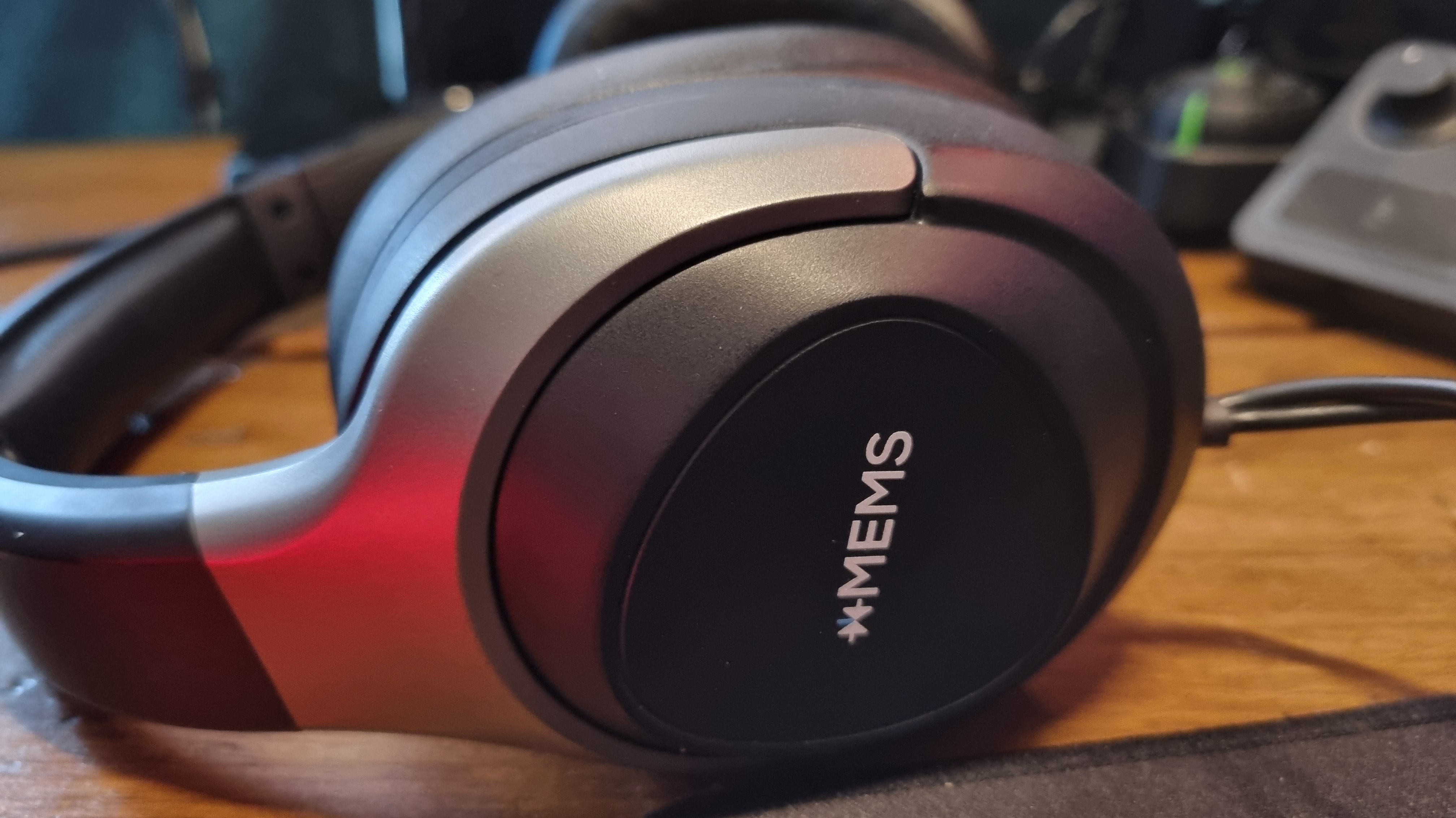 The outer earcup of the xMEMS gaming headset, with the xMEMS logo visible