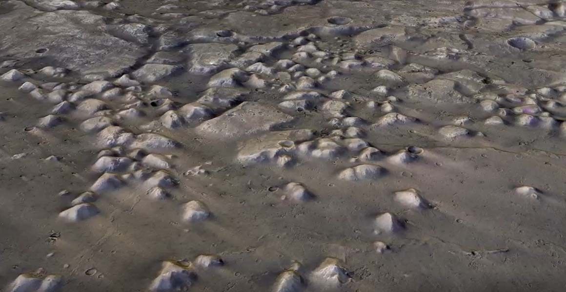 Some of the Martian buttes and mesas on the Red Planet&#039;s northern plains. Inside these eroded mounds are layers of clay formed by liquid water.