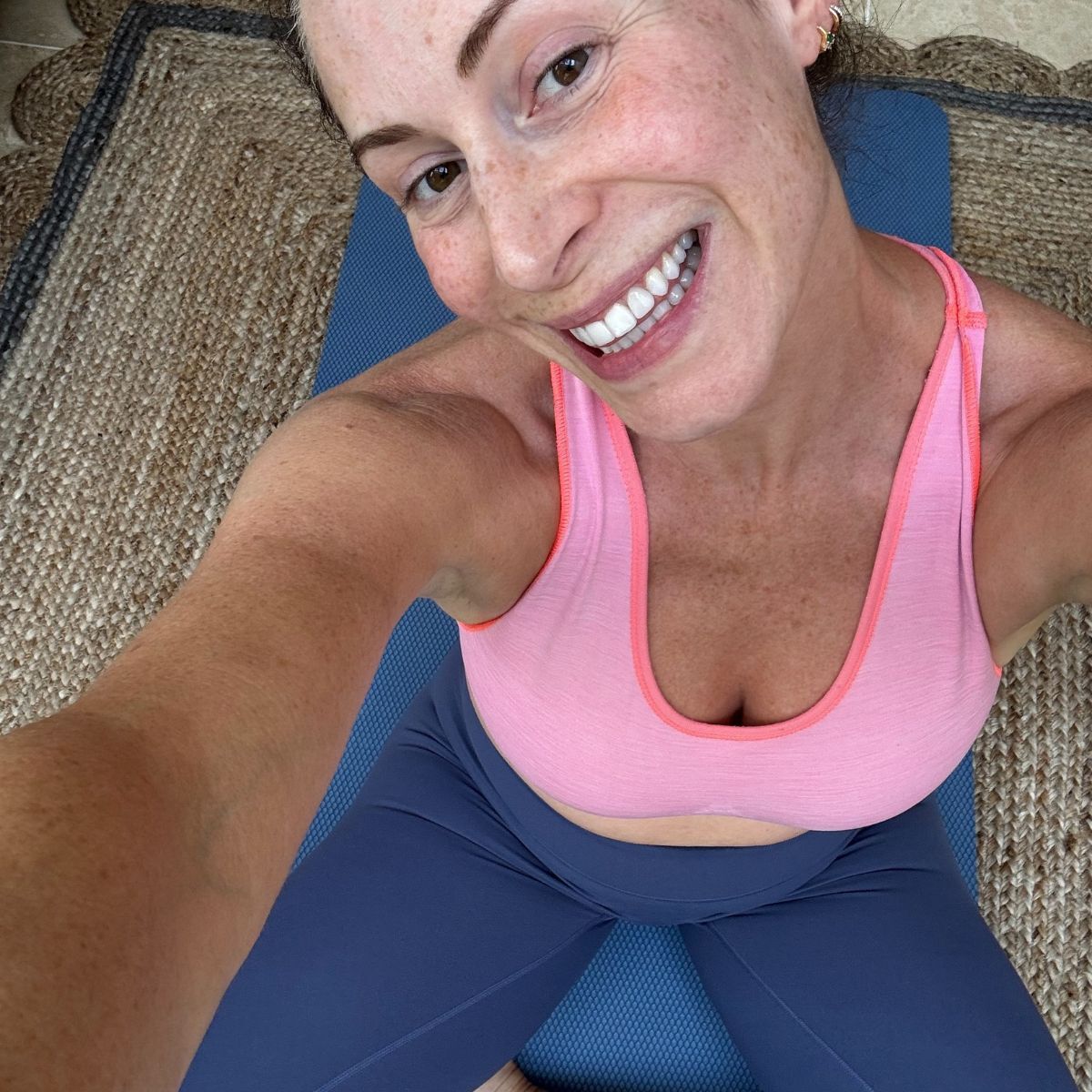 Health writer Anna Bartter trying the 5-5-5-30 morning routine, at home in her workout clothes