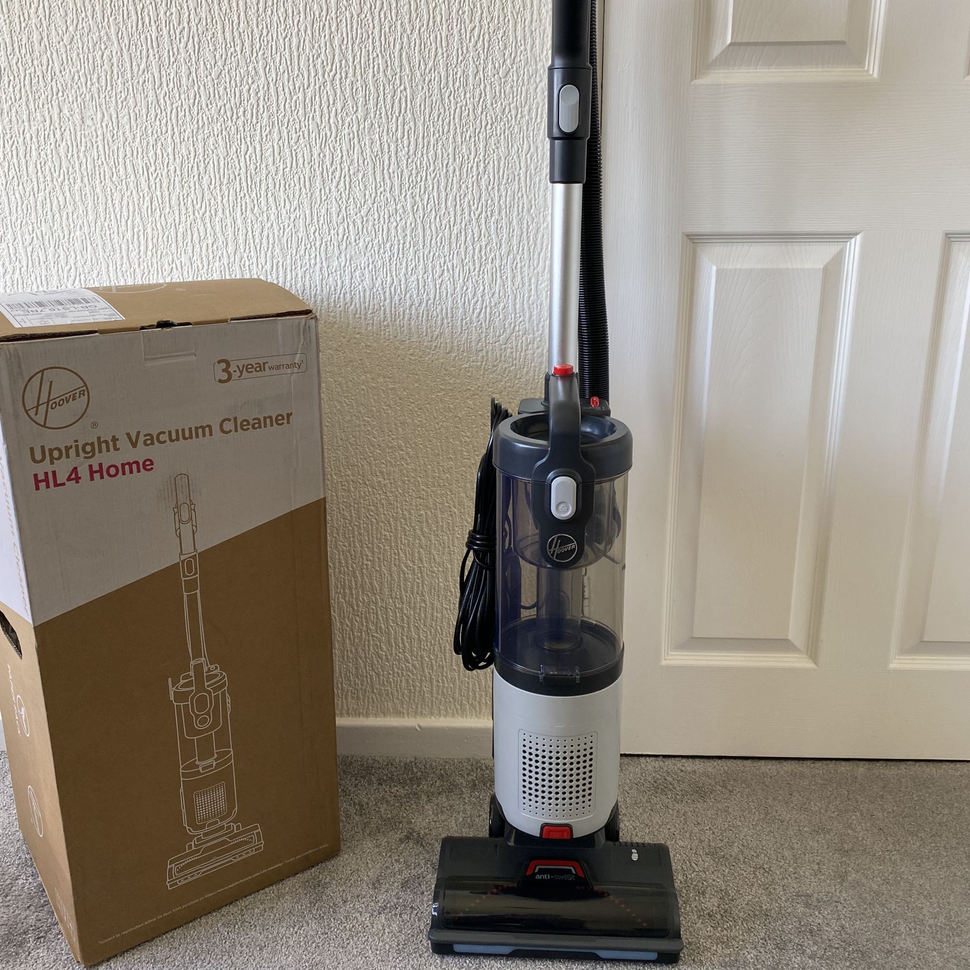 Hoover HL4 Upright Vacuum Cleaner next to box