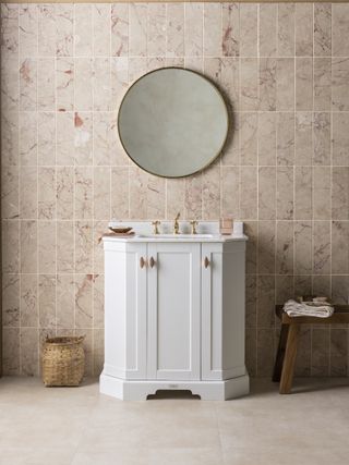 soft clay colored bathroom with pink tile