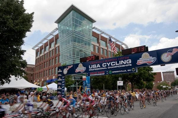 Riders pass through the start/finish area.
