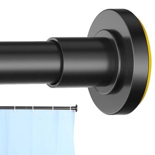 The end of a black adjustable tension rod with a yellow rubber end. on a white background. 