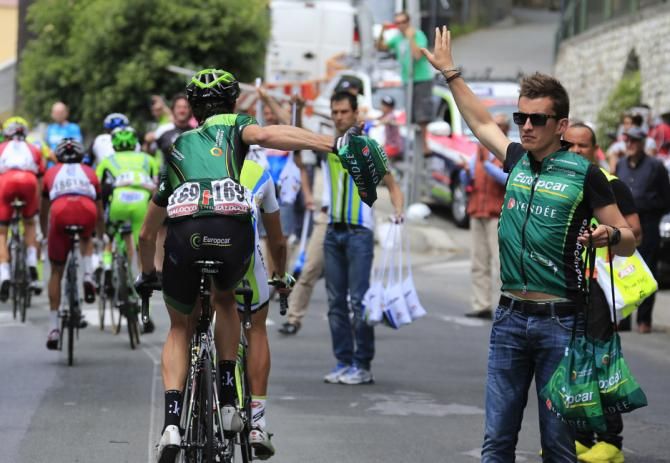 A Europcar rider picks up his musette