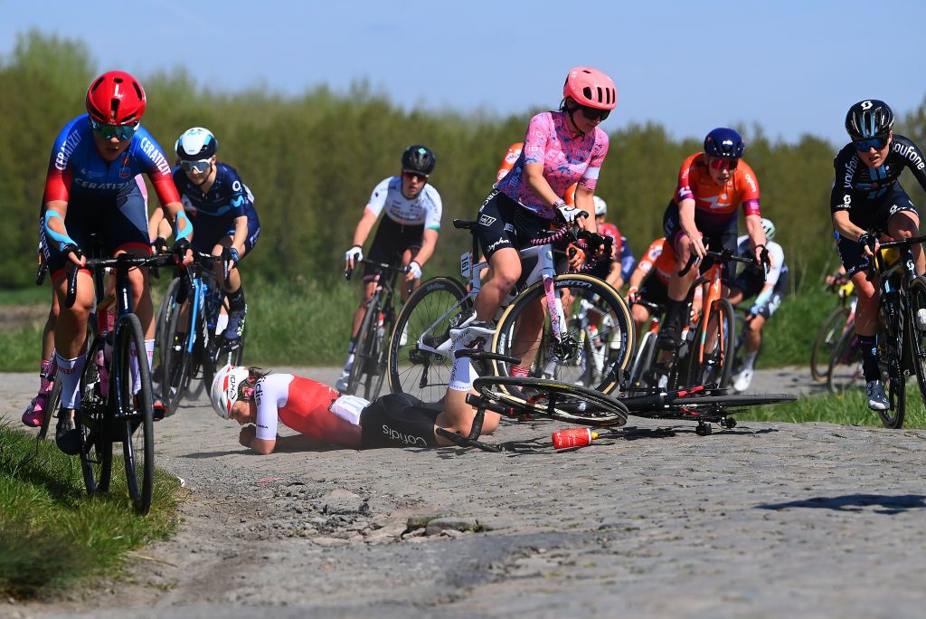 ROUBAIX FRANCE APRIL 16 Gabrielle PiloteFortin of Canada and Team Cofidis Fminin and Letizia Borghesi of Italy and Team EF Education Tibco Svb crash during the 2nd ParisRoubaix 2022 Womens Elite a 1247km one day race from Denain to Roubaix ParisRoubaixFemmes ParisRoubaix on April 16 2022 in Roubaix France Photo by Tim de WaeleGetty Images