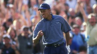 Tiger Woods celebrates his hole-in-one at the 1997 Phoenix Open