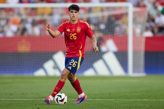 Spain 2024 Olympics squad Pau Cubarsi of Spain runs with the ball during the international friendly match between Spain and Andorra at Nuevo Vivero on June 05, 2024 in Badajoz, Spain. (Photo by Jesus Ruiz/Quality Sport Images/Getty Images)