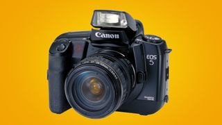 Canon A2 EOS 5 on a yellow background