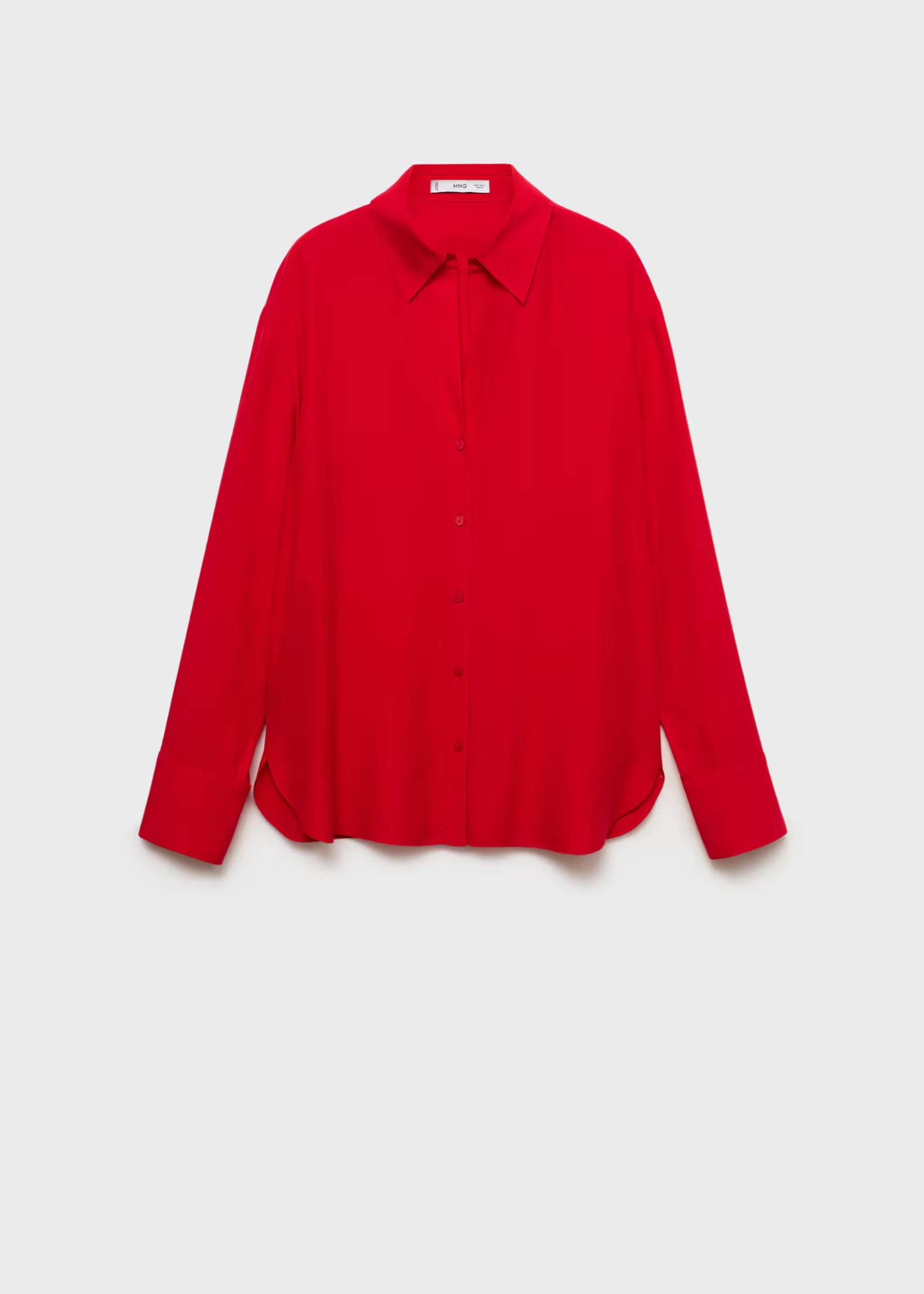 Long sleeve top complete with button up closure and a patch pocket on the chest. 
