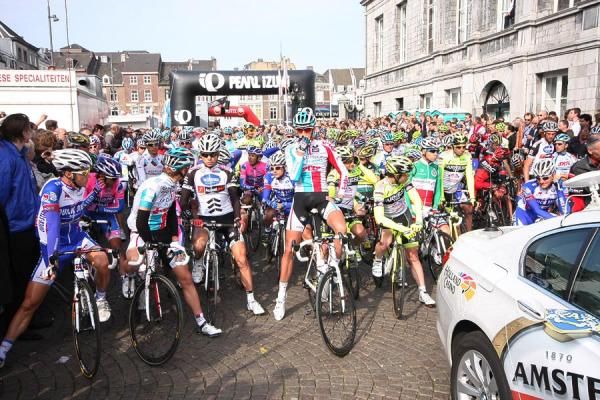 Riders wait for the start of the race
