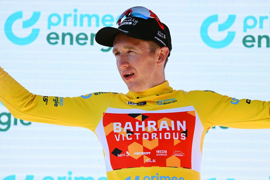 KUSNACHT SWITZERLAND JUNE 12 Stephen Williams of United Kingdom and Team Bahrain Victorious celebrates winning the yellow leader jersey on the podium ceremony after the 85th Tour de Suisse 2022 Stage 1 a 1776km stage from Kusnacht to Kusnacht 679m ourdesuisse2022 WorldTour on June 12 2022 in Kusnacht Switzerland Photo by Tim de WaeleGetty Images