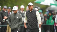 Tiger Woods in action, walking during Round Two of the Masters Tournament at Augusta National