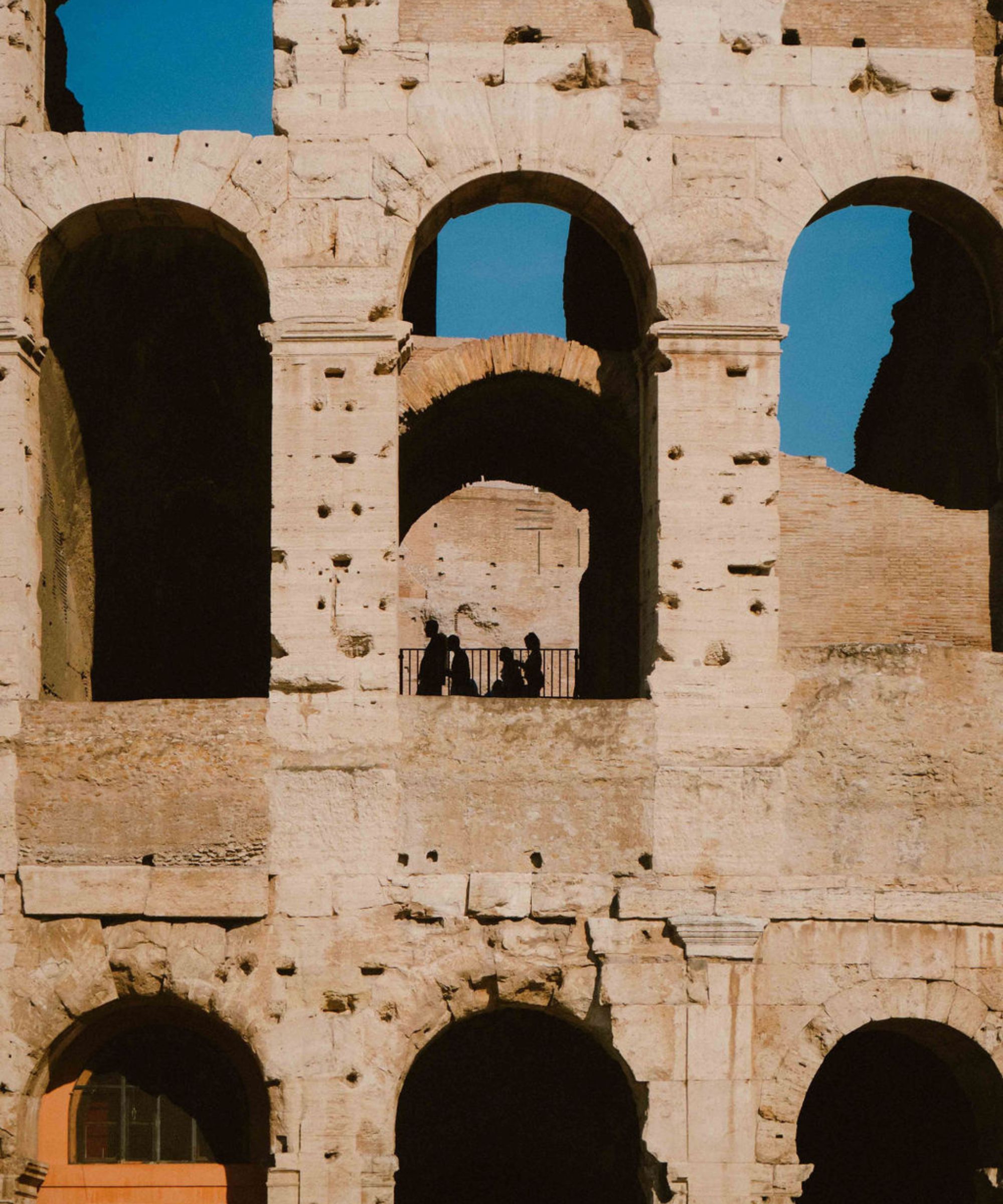 Close up of Colosseum, arch windows in the stone