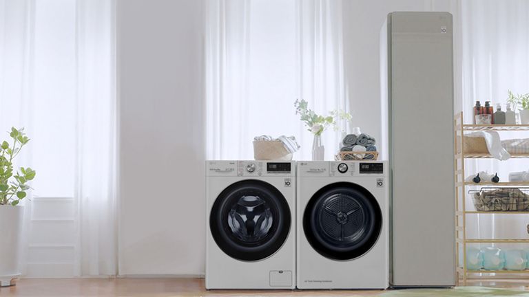 LG washing machines in a white laundry room