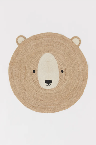 Jute childrens' rug depicting a bear face from H&M Home.