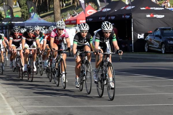 Cromwell and Amanda Spratt (GreenEDGE) are marked by Chloe Hosking (Total Rush) and the BikeExchange team