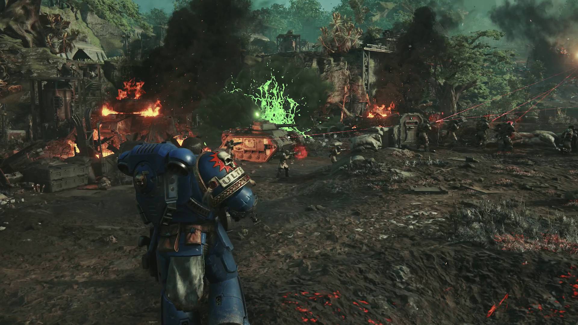 Space Marine 2 Titus walking through Astra Militarum battleline under attack from Tyranids