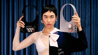 A woman holding a Nik Bentel speaker bag and a mixer bag, almost like earrings, wearing a half-and-half monochrome dress, in front of a navy curtain