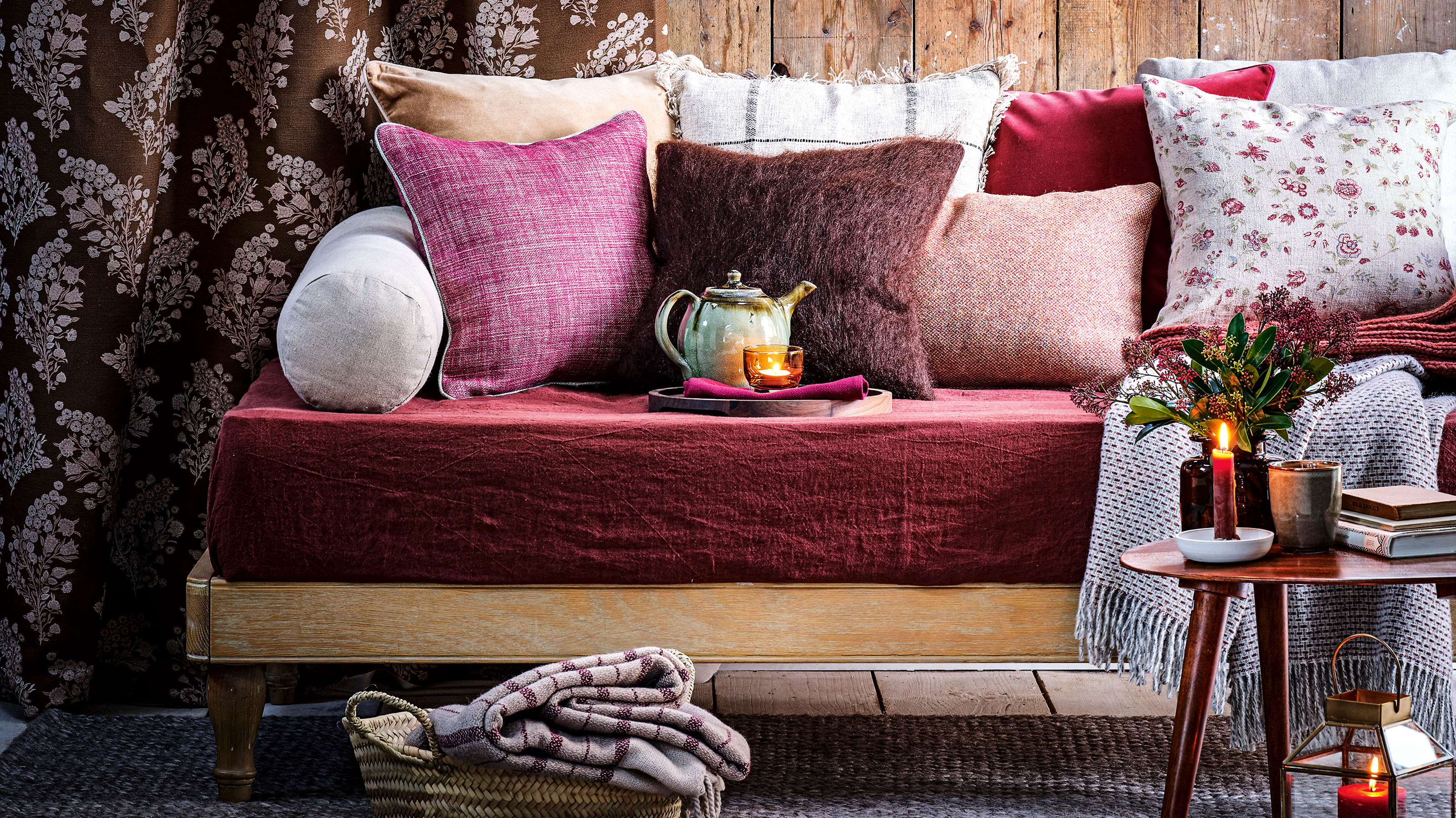 Wooden wall with bed, with purple daybed layered with cushions