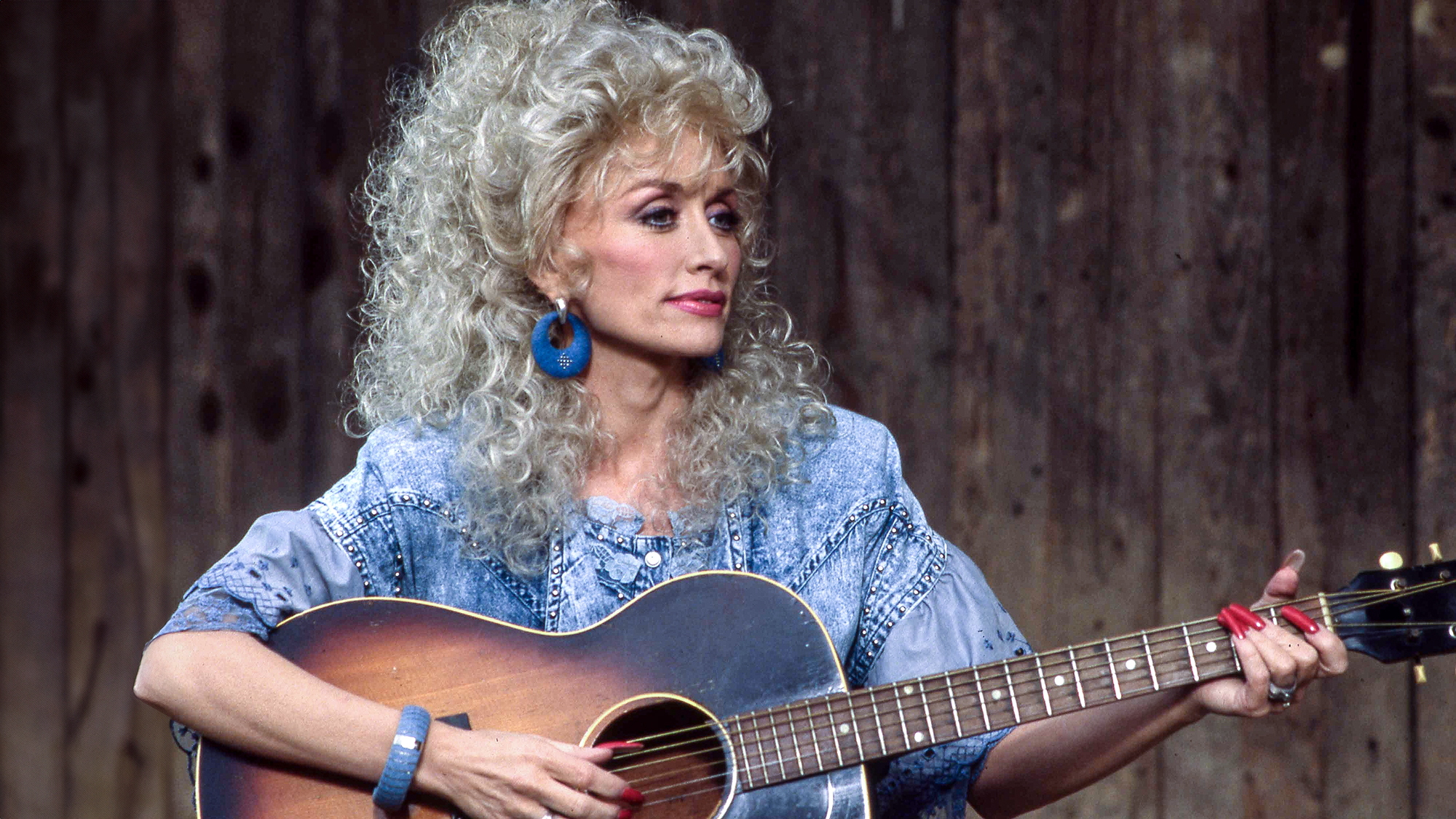 American country musician Dolly Parton performing on her ABC TV variety show,'Dolly' in 1987. 