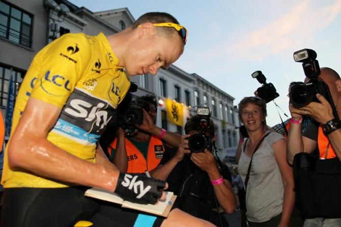 Chris Froome (Sky) signs autographs in Aalst