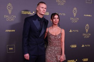 Manchester City's Norwegian forward Erling Haaland (L) and his wife Isabel Haugseng Johansen pose prior to the 2023 Ballon d'Or France Football award ceremony at the Theatre du Chatelet in Paris on October 30, 2023.